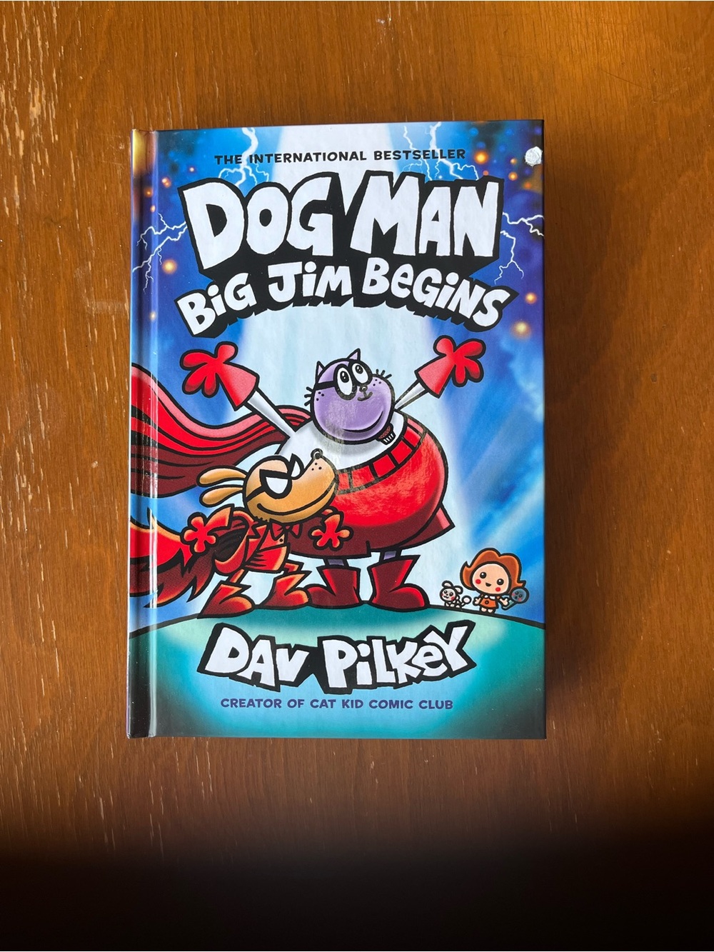 Scholastic Dog Man Illustrated Cover in Blue, Red, Purple